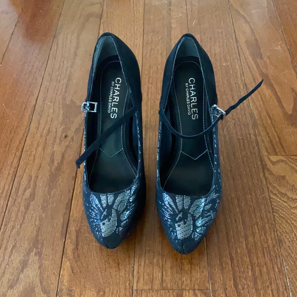 Black suede and metallic pumps.